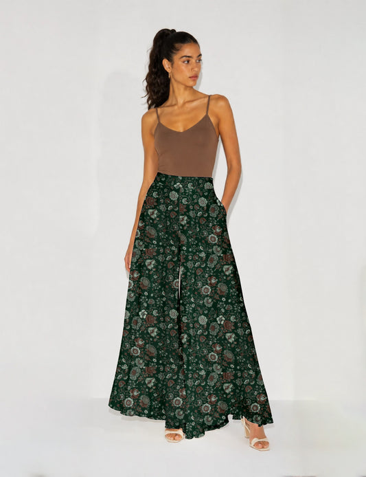 Women's wide leg palazzo trousers with a fitted waistband and relaxed flowing silhouette.