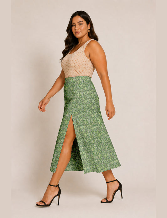 Woman wearing a yellow and black micro patterned A-line skirt with front slit, paired with beige sleeveless top and black