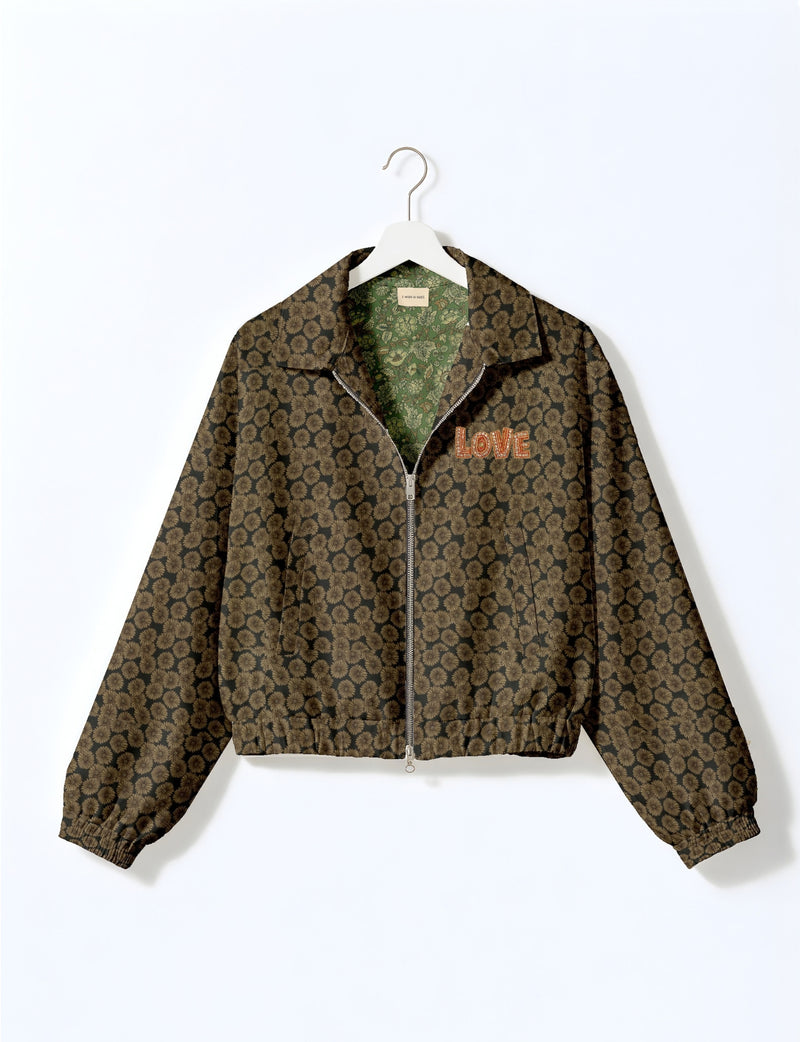 Love Bomber Jacket made from recycled fabric, featuring hand-stitched Aari embroidery. A unique piece of zero-waste clothing, part of the circular fashion movement. Designed with upcycled materials for a stylish yet environmentally friendly clothing choice.