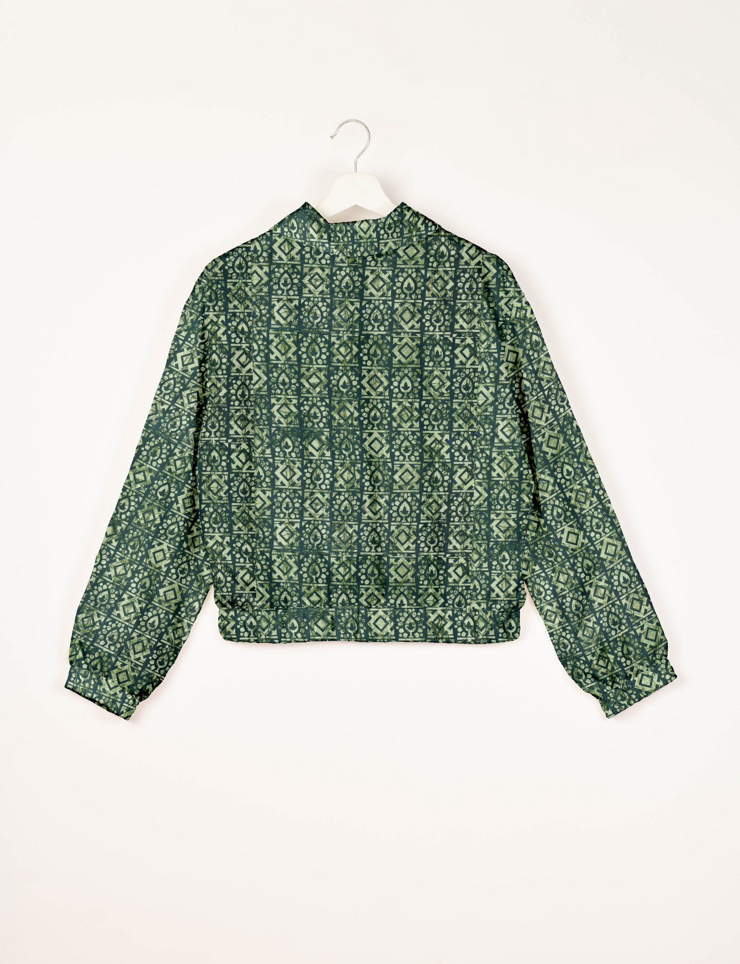 Upcycled Bomber Jacket made from recycled sari materials, featuring a cute cropped shape, elasticated hem and cuffs, and contrast sari print lining. Sustainable apparel promoting eco-friendly fashion and ethical clothing.