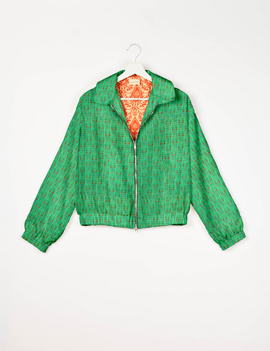 Upcycled Bomber Jacket made from recycled sari materials, featuring a cute cropped shape, elasticated hem and cuffs, and contrast sari print lining. Sustainable apparel promoting eco-friendly fashion and ethical clothing.