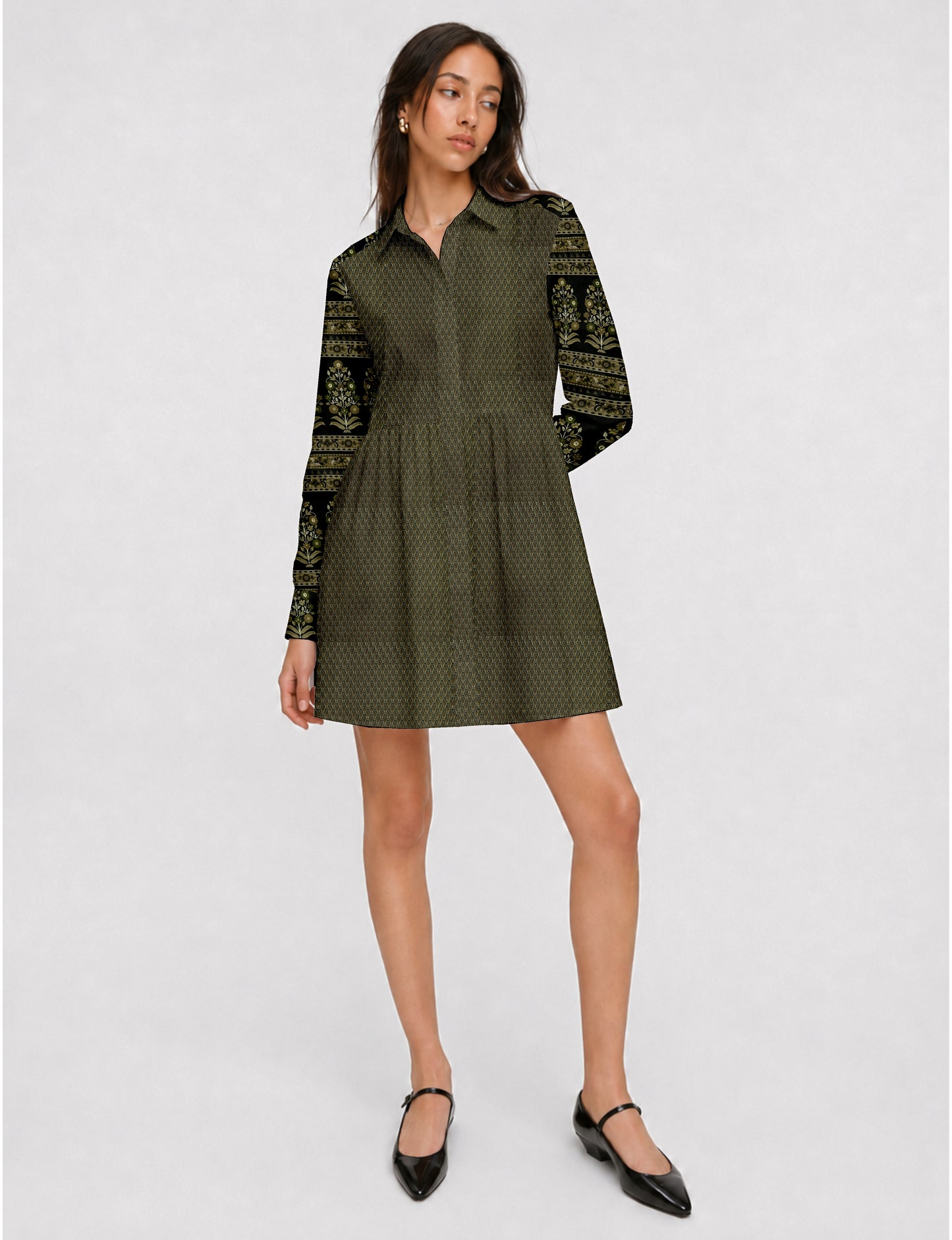 Short shirt dress with a relaxed A-line silhouette, point collar, partial button placket, gathered waist, side pockets, and full-length cuffed sleeves.