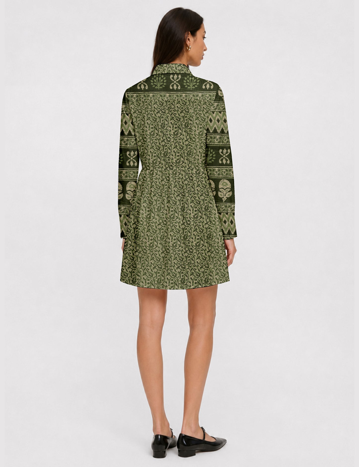 Short shirt dress with a relaxed A-line silhouette, point collar, partial button placket, gathered waist, side pockets, and full-length cuffed sleeves.