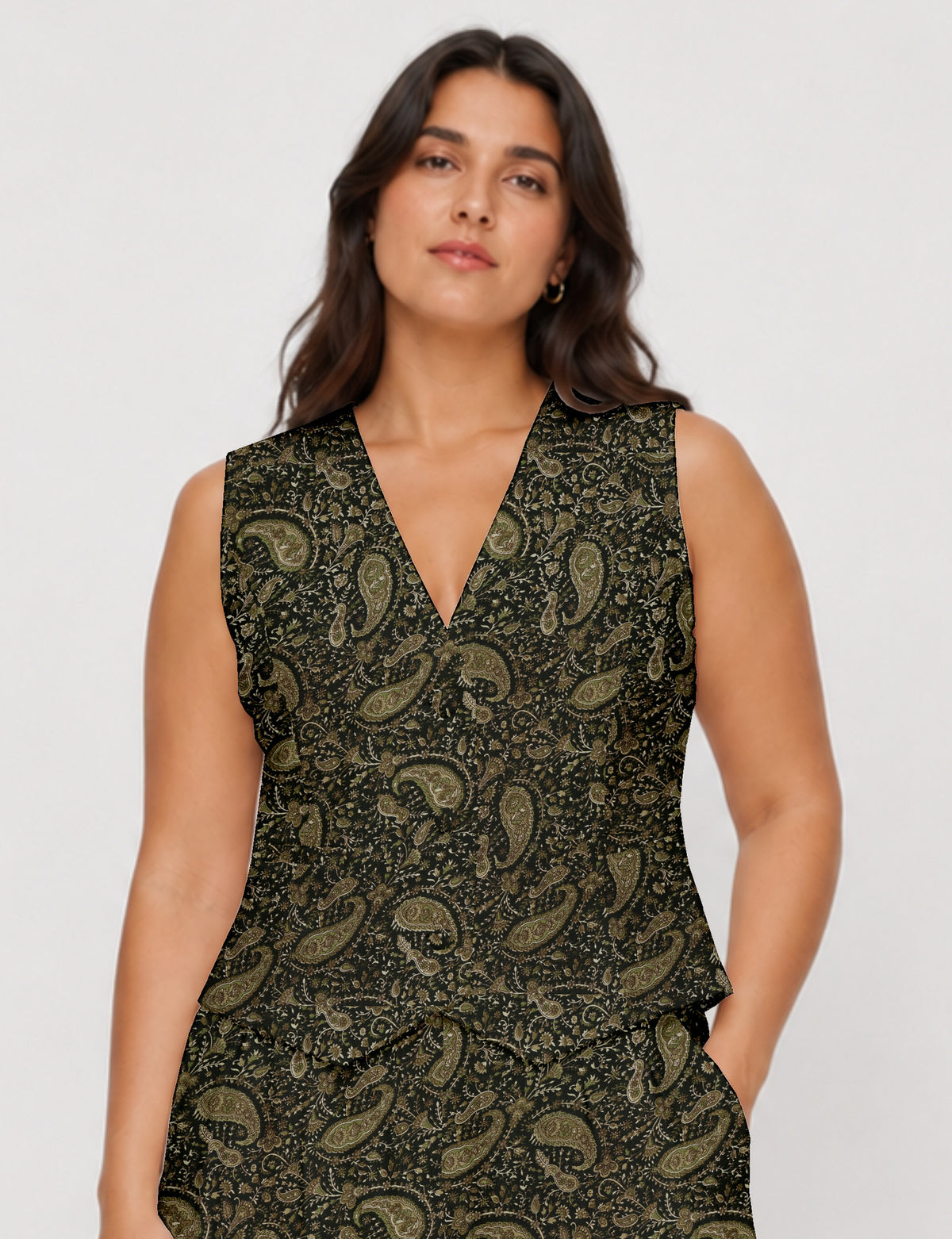 Women's fitted waistcoat with V-neck, single-breasted button closure, tailored silhouette, and pointed hem in sustainable fashion.