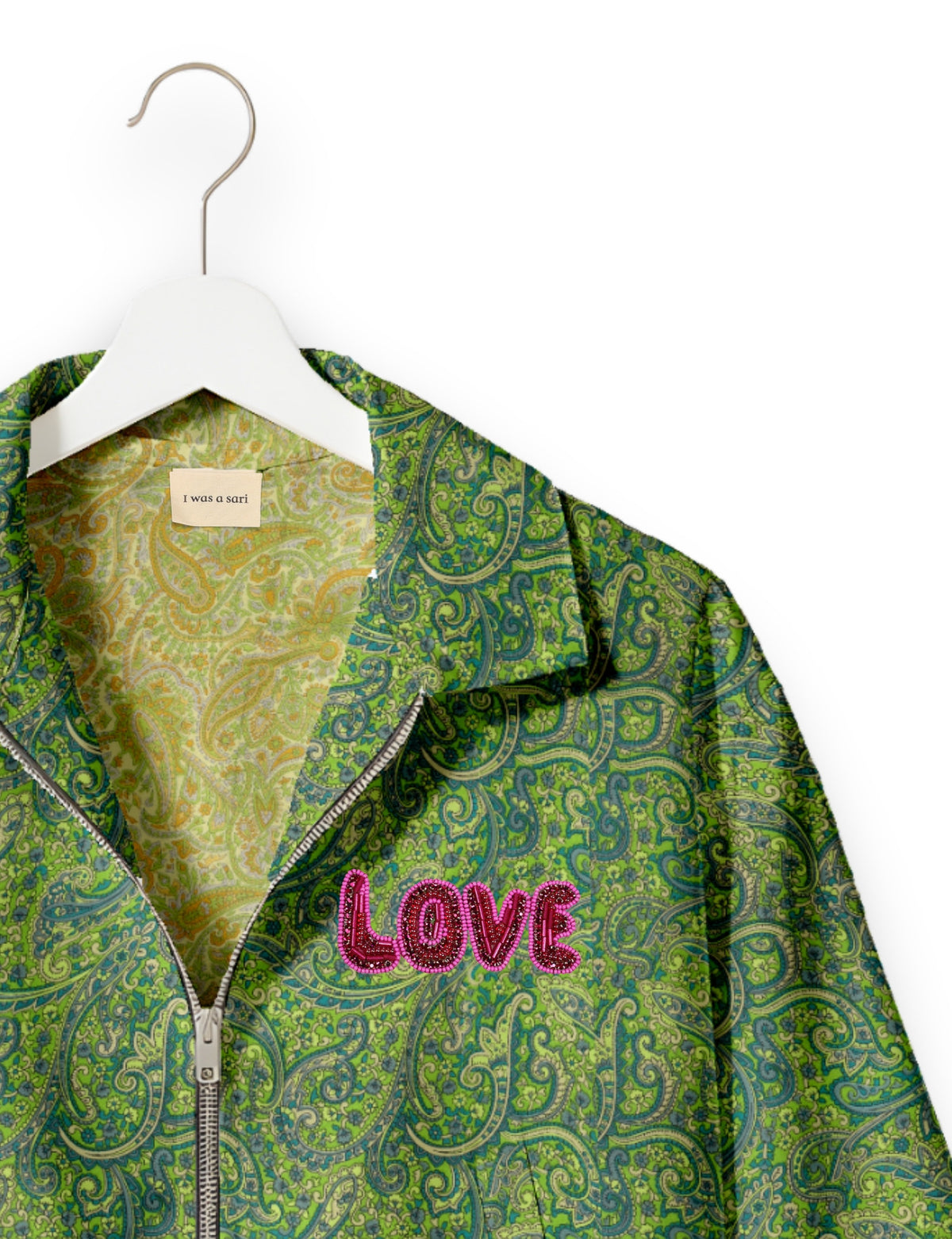 Love Bomber Jacket made from recycled fabric, featuring hand-stitched Aari embroidery. A unique piece of zero-waste clothing, part of the circular fashion movement. Designed with upcycled materials for a stylish yet environmentally friendly clothing choice.