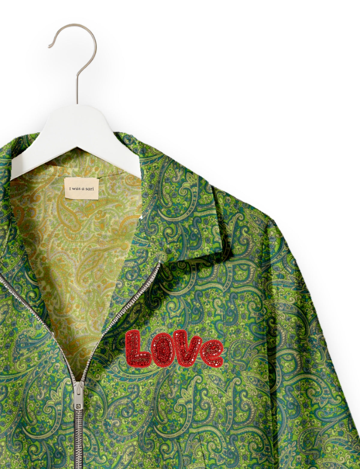 Love Bomber Jacket made from recycled fabric, featuring hand-stitched Aari embroidery. A unique piece of zero-waste clothing, part of the circular fashion movement. Designed with upcycled materials for a stylish yet environmentally friendly clothing choice.