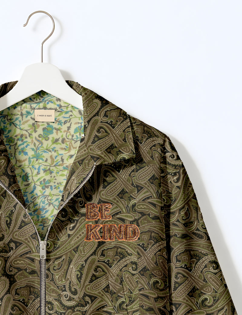 BE KIND Bomber jacket made from upcycled sari fabric with handcrafted Aari embroidery by female artisans.