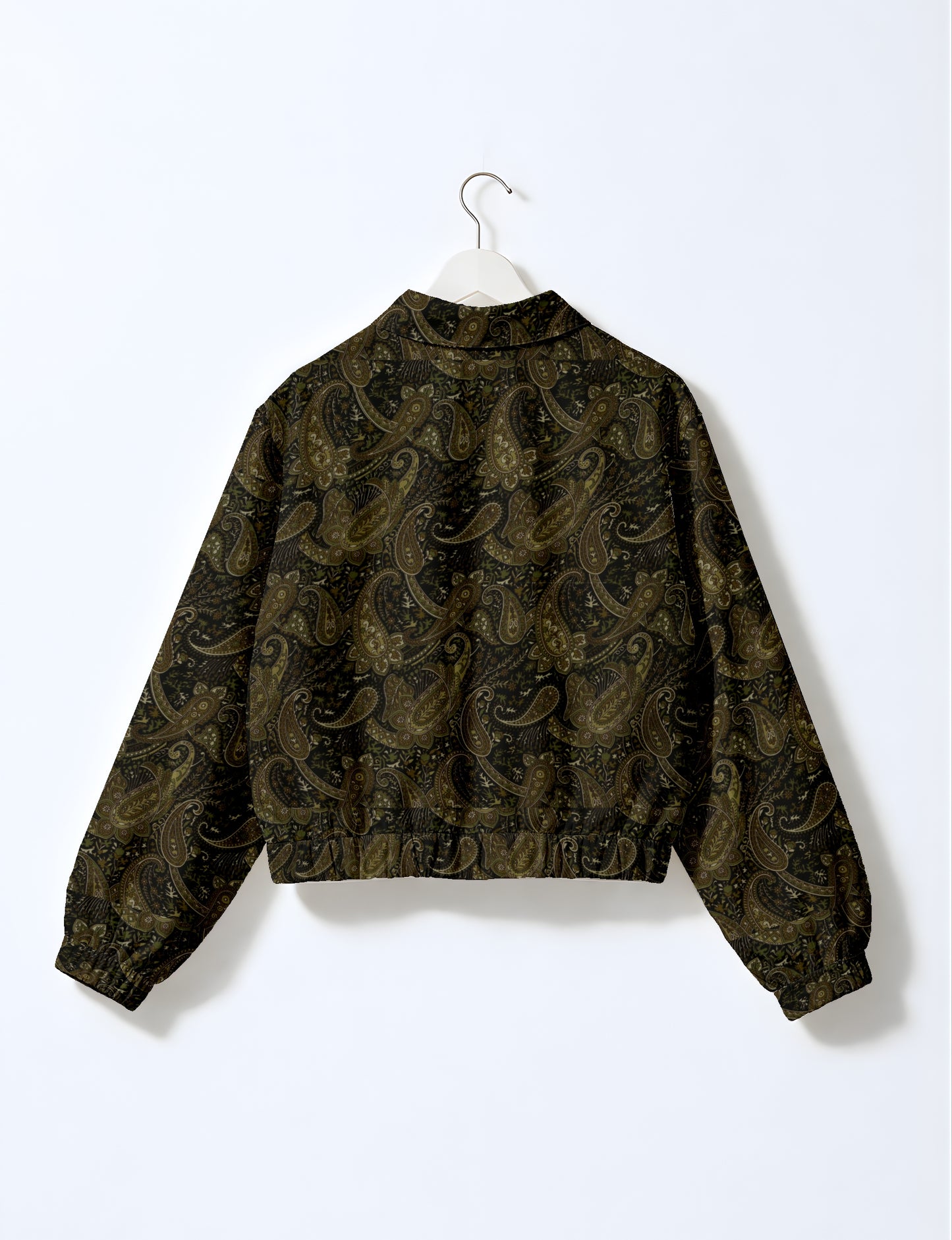 Women's cropped bomber jacket with twin metallic front zippers, welt pockets, elasticated hem and cuffs, and contrast sari print lining.