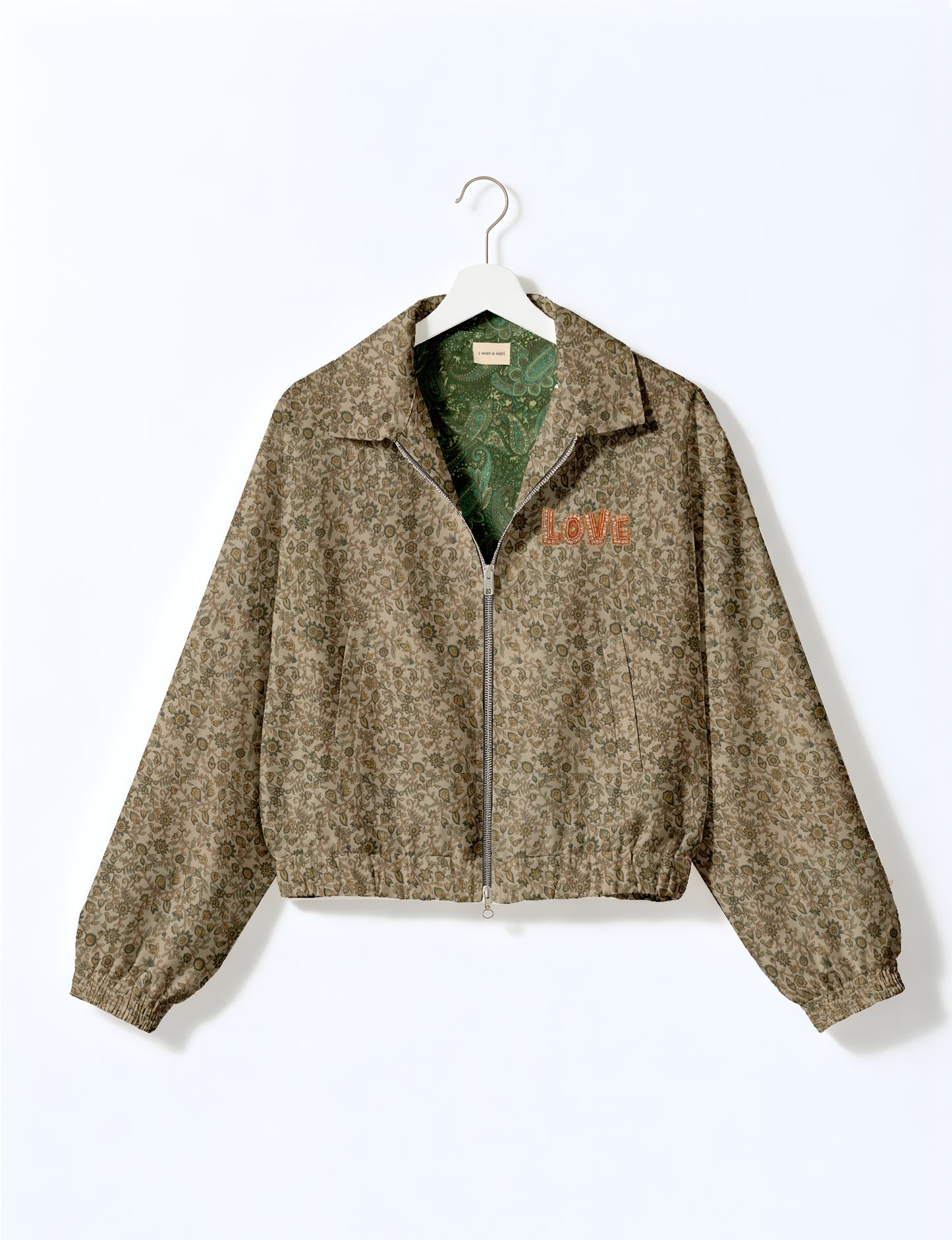 Love Bomber Jacket made from recycled fabric, featuring hand-stitched Aari embroidery. A unique piece of zero-waste clothing, part of the circular fashion movement. Designed with upcycled materials for a stylish yet environmentally friendly clothing choice.