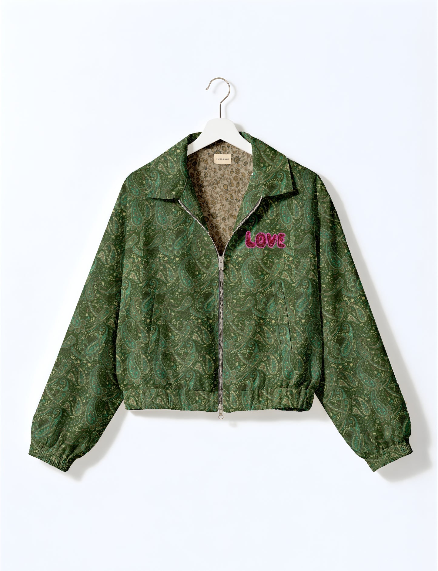 Love Bomber Jacket made from recycled fabric, featuring hand-stitched Aari embroidery. A unique piece of zero-waste clothing, part of the circular fashion movement. Designed with upcycled materials for a stylish yet environmentally friendly clothing choice.
