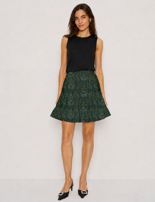 Short tiered skirt with a fitted waistband, knife pleats, softly flared silhouette, side seam pockets, and above-the-knee length.