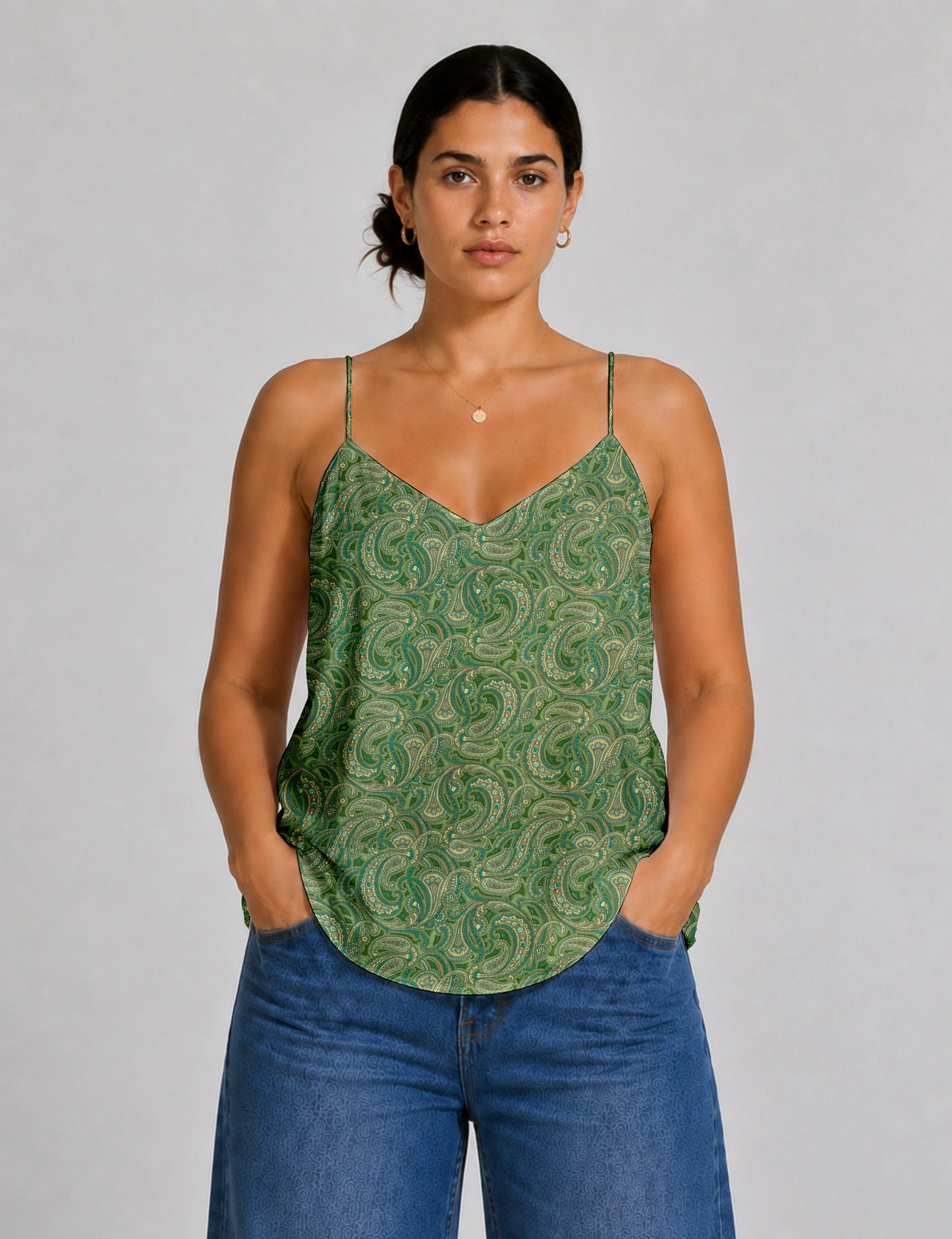 Women's sleeveless slip top with a relaxed straight fit, soft V-neckline, deep V-back, and delicate spaghetti straps.