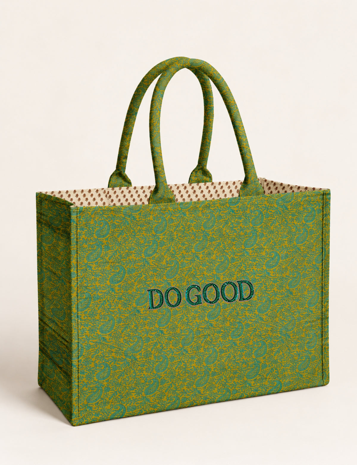 Structured DO GOOD work tote bag featuring embroidered appliqué lettering on the front, double padded shoulder handles and an internal zippered pocket.