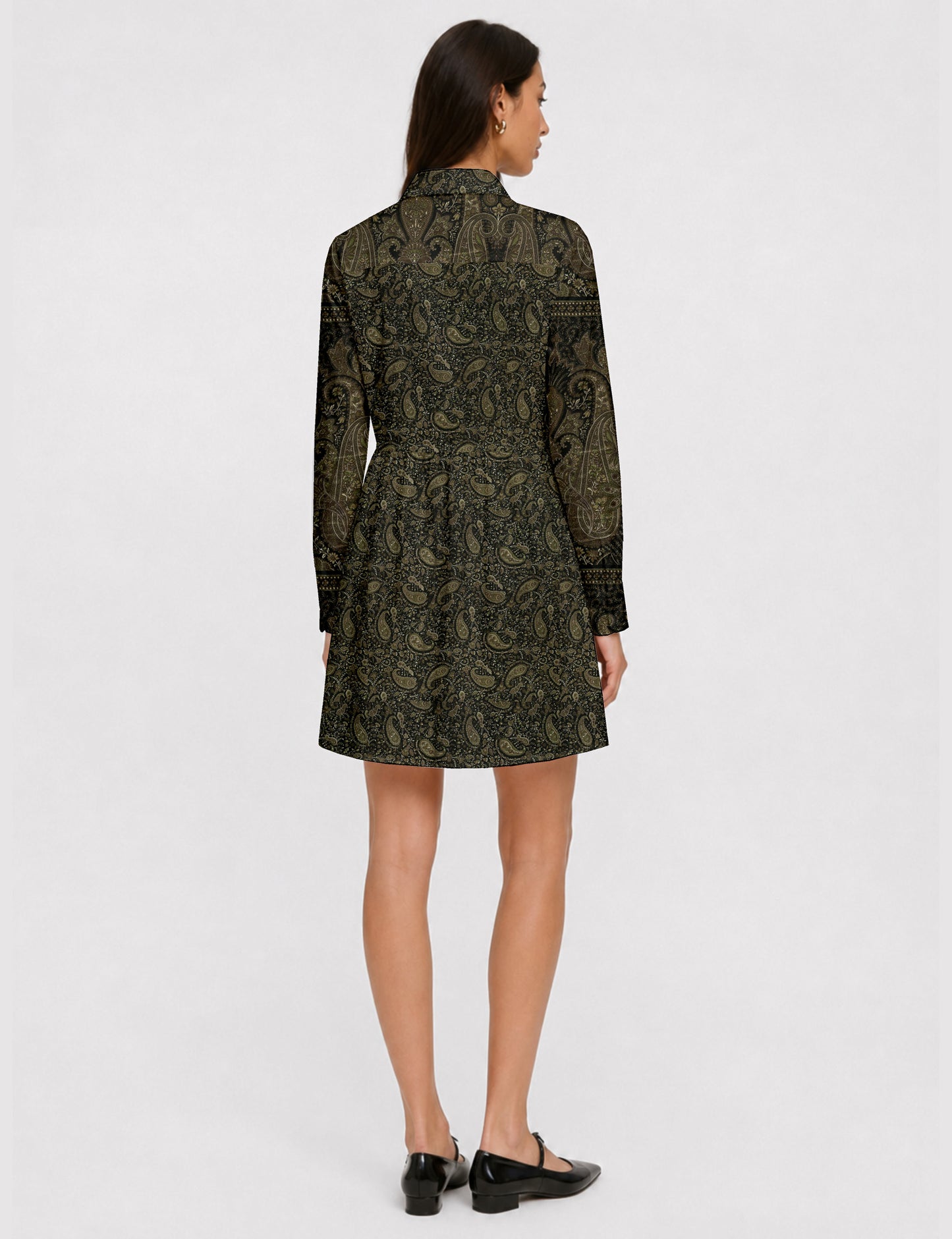 Short shirt dress with a relaxed A-line silhouette, point collar, partial button placket, gathered waist, side pockets, and full-length cuffed sleeves.