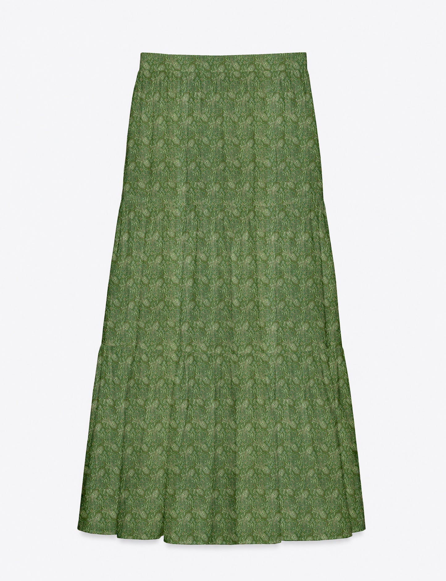 Woman wearing a yellow midi tiered skirt with a small geometric pattern, shown from the back, paired with beige top and