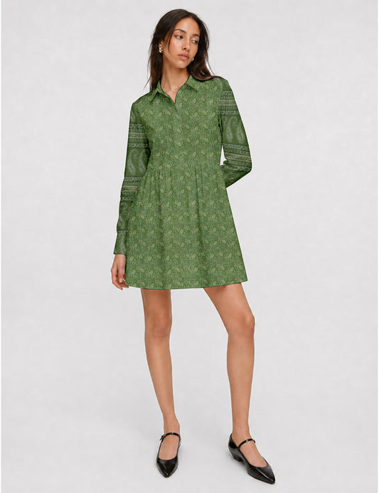 Short shirt dress with a relaxed A-line silhouette, point collar, partial button placket, gathered waist, side pockets, and full-length cuffed sleeves.
