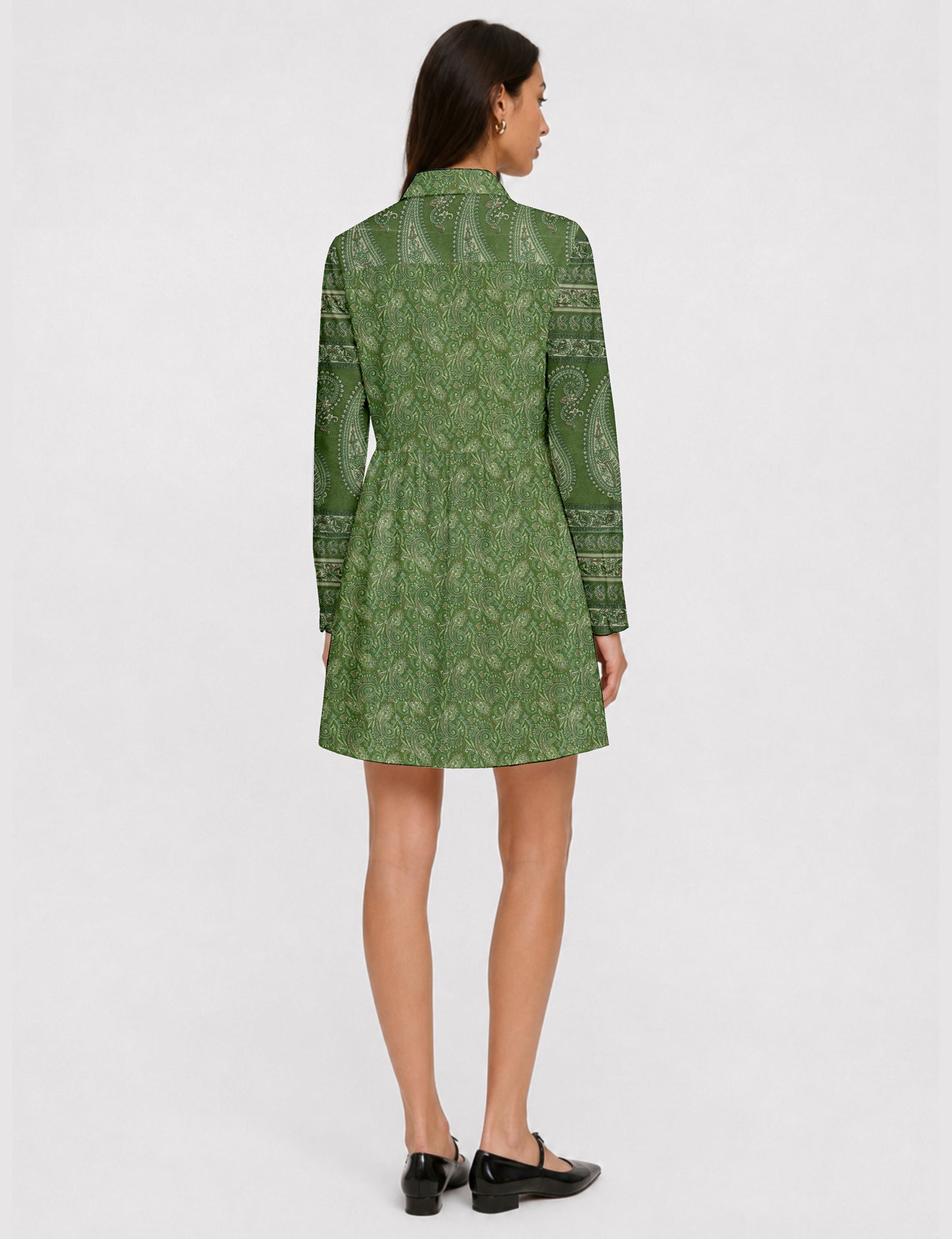 Short shirt dress with a relaxed A-line silhouette, point collar, partial button placket, gathered waist, side pockets, and full-length cuffed sleeves.