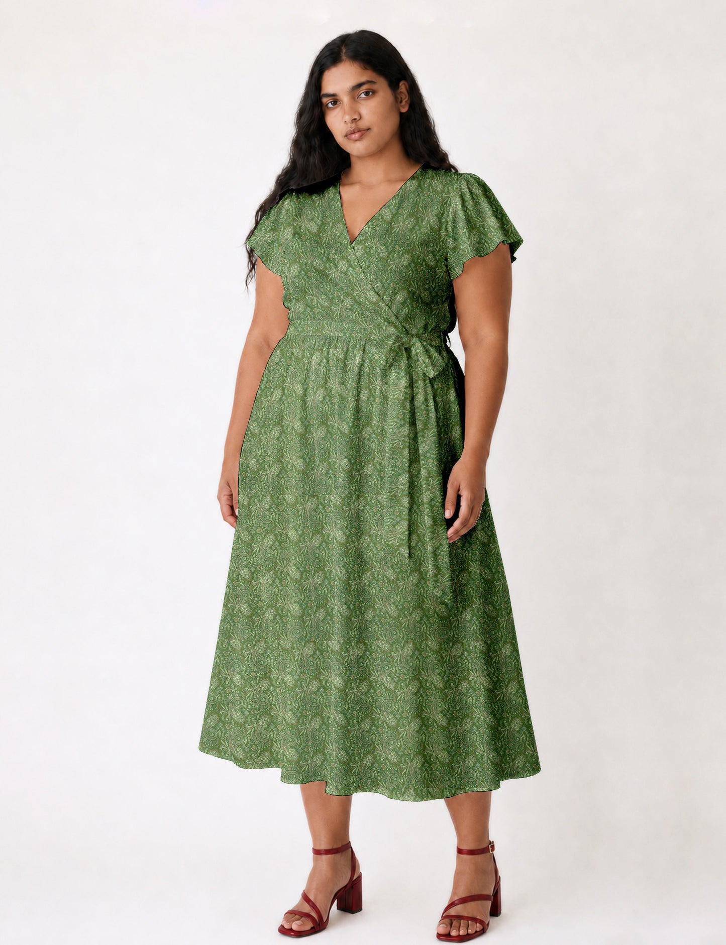 Elegant midi wrap dress with a V-neckline, adjustable waist tie, fitted bodice, and flared skirt for a timeless, flattering silhouette.