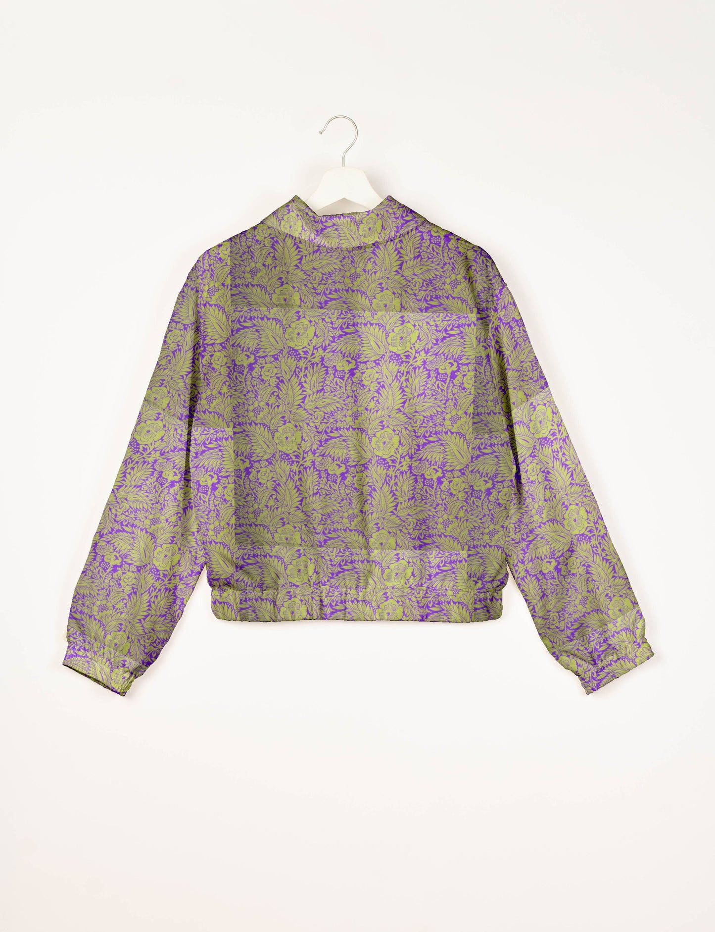 Upcycled Bomber Jacket made from recycled sari materials, featuring a cute cropped shape, elasticated hem and cuffs, and contrast sari print lining. Sustainable apparel promoting eco-friendly fashion and ethical clothing.
