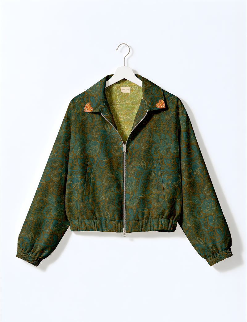 Love Bomber Jacket made from recycled fabric, featuring hand-stitched Aari embroidery. A unique piece of zero-waste clothing, part of the circular fashion movement. Designed with upcycled materials for a stylish yet environmentally friendly clothing choice.