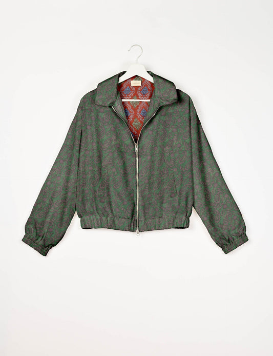 Upcycled Bomber Jacket made from recycled sari materials, featuring a cute cropped shape, elasticated hem and cuffs, and contrast sari print lining. Sustainable apparel promoting eco-friendly fashion and ethical clothing.
