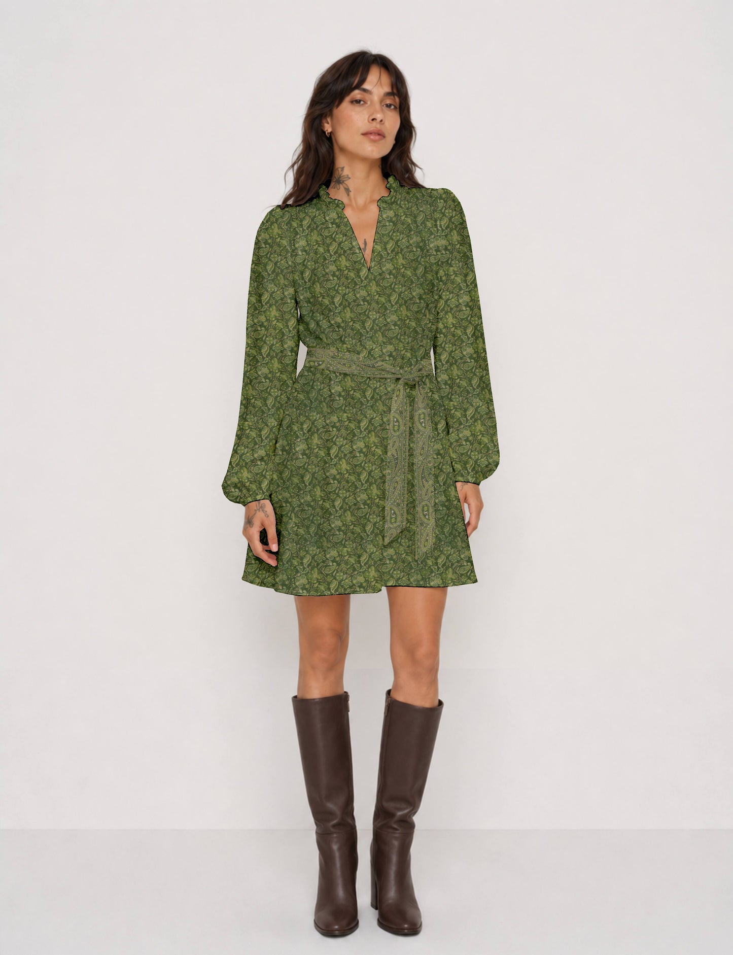 Swing dress with detachable tie belt, gathered ruffle neckline, full-length voluminous sleeves, elastic cuffs, and relaxed A-line silhouette in an above-knee length.