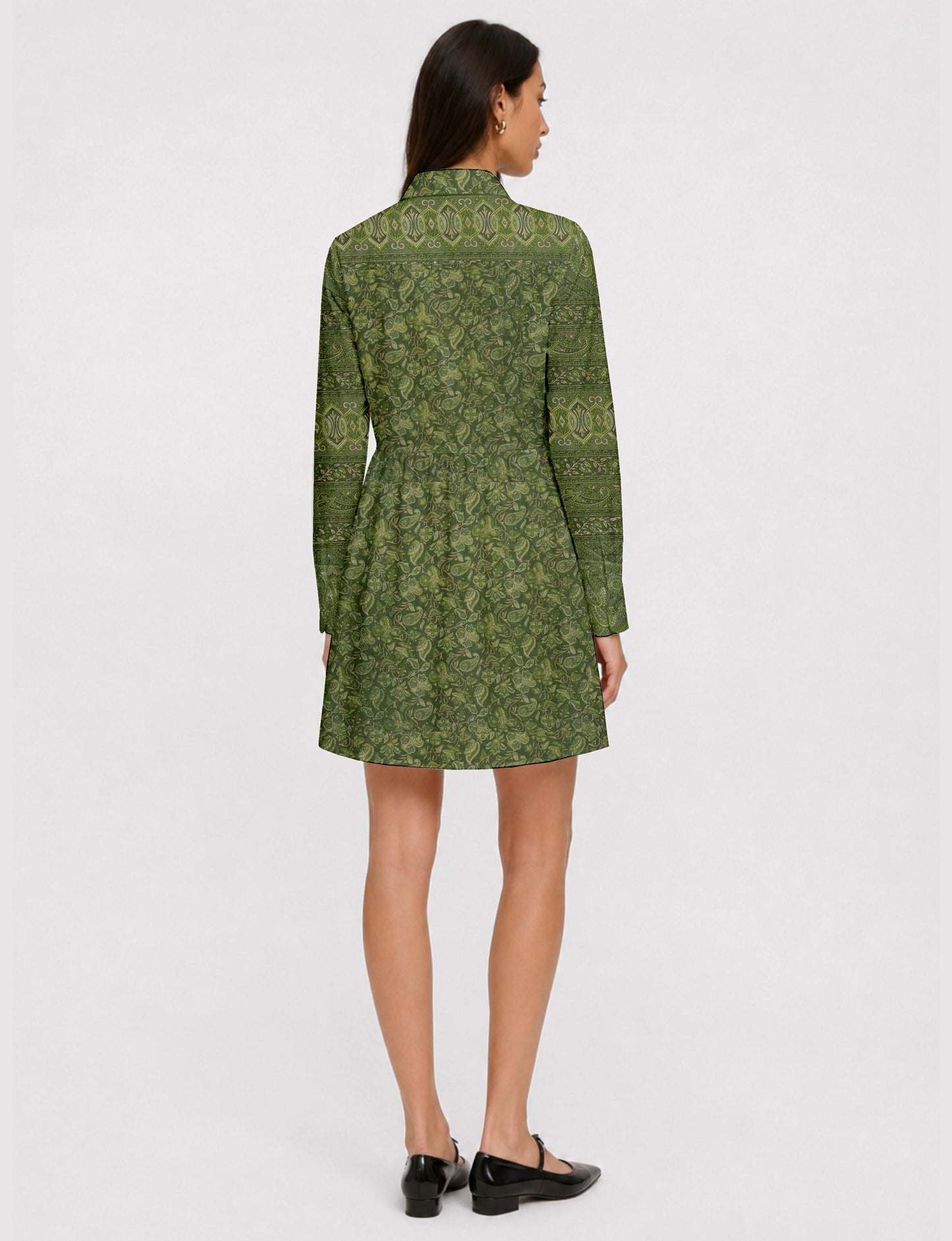 Short shirt dress with a relaxed A-line silhouette, point collar, partial button placket, gathered waist, side pockets, and full-length cuffed sleeves.