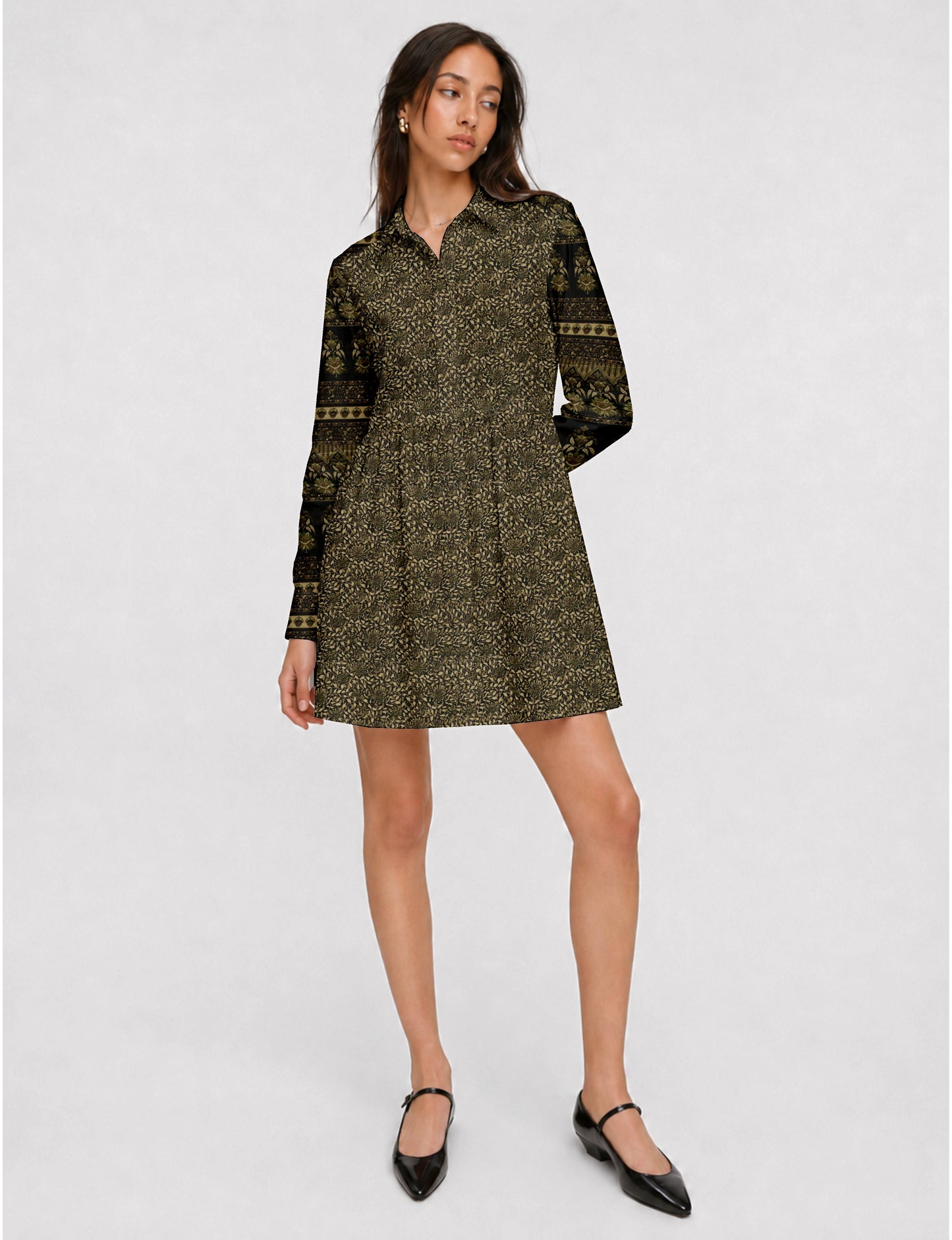 Short shirt dress with a relaxed A-line silhouette, point collar, partial button placket, gathered waist, side pockets, and full-length cuffed sleeves.