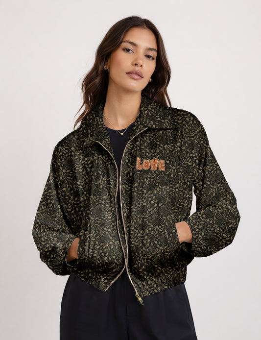 Love Bomber Jacket made from recycled fabric, featuring hand-stitched Aari embroidery. A unique piece of zero-waste clothing, part of the circular fashion movement. Designed with upcycled materials for a stylish yet environmentally friendly clothing choice.