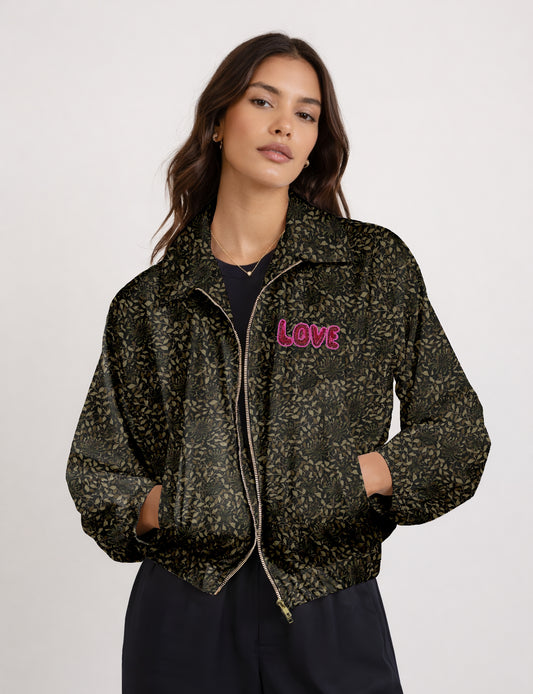 Love Bomber Jacket made from recycled fabric, featuring hand-stitched Aari embroidery. A unique piece of zero-waste clothing, part of the circular fashion movement. Designed with upcycled materials for a stylish yet environmentally friendly clothing choice.
