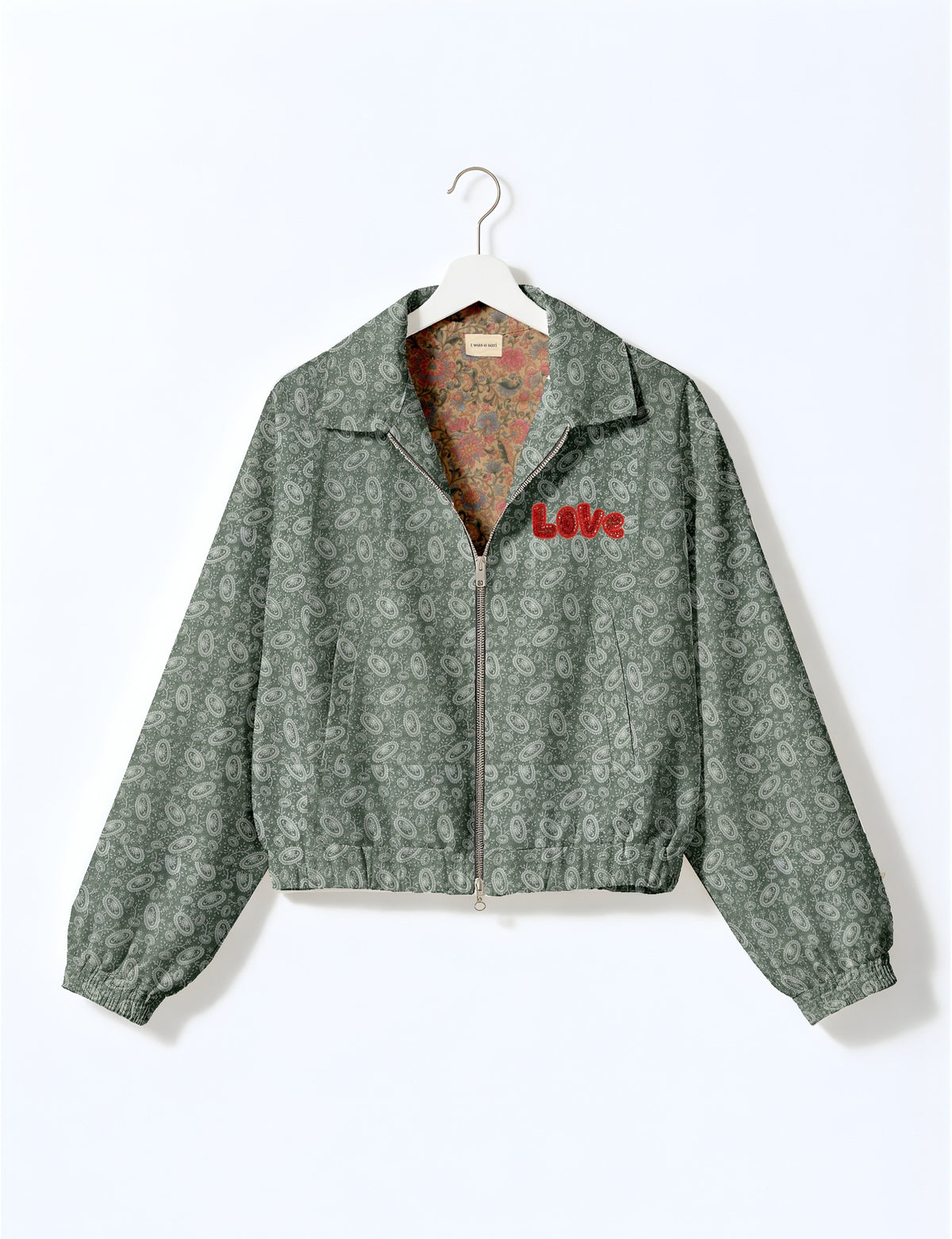 Love Bomber Jacket made from recycled fabric, featuring hand-stitched Aari embroidery. A unique piece of zero-waste clothing, part of the circular fashion movement. Designed with upcycled materials for a stylish yet environmentally friendly clothing choice.