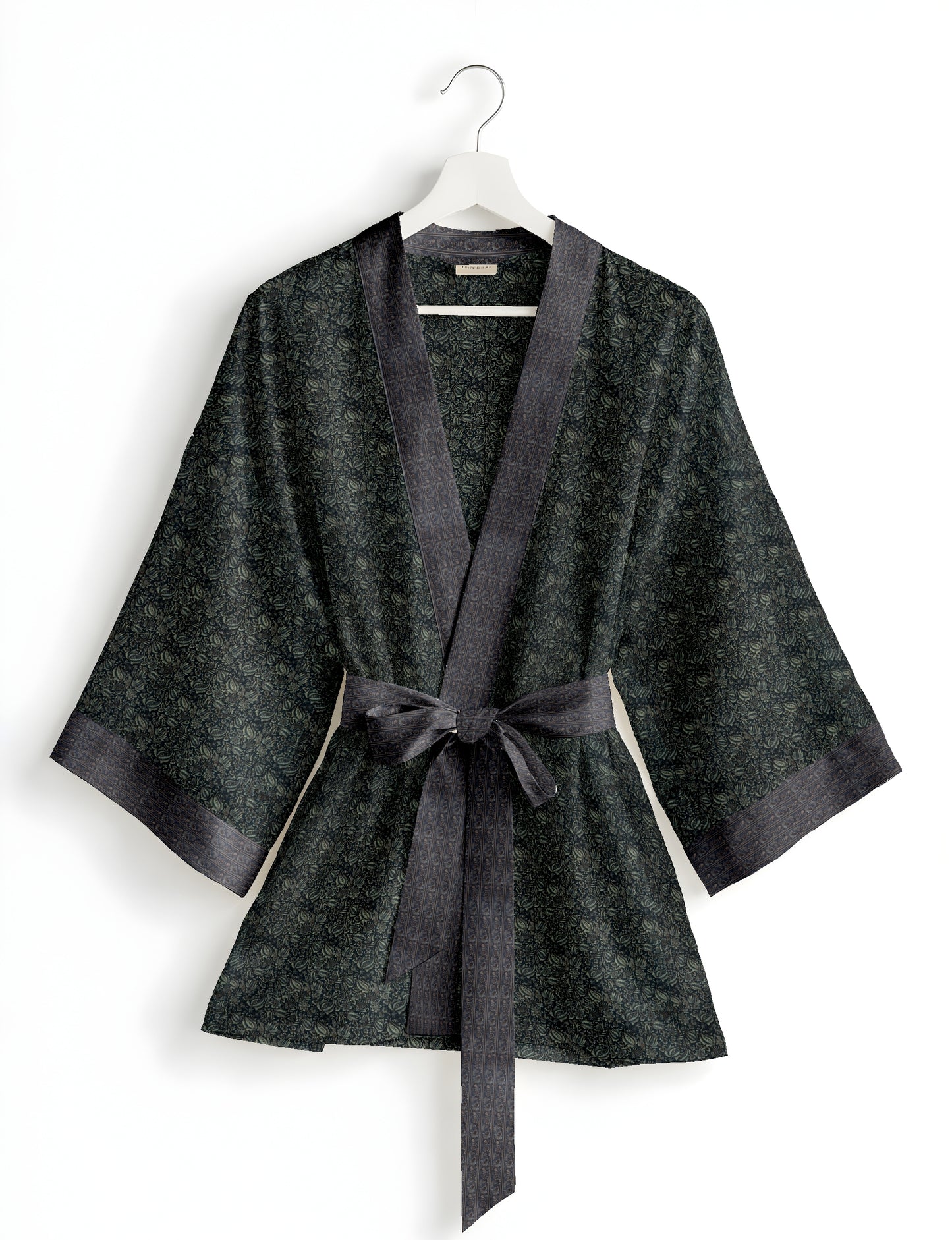 Short kimono robe with wrap front, V-neckline, wide sleeves, waist tie, and concealed skort detail.