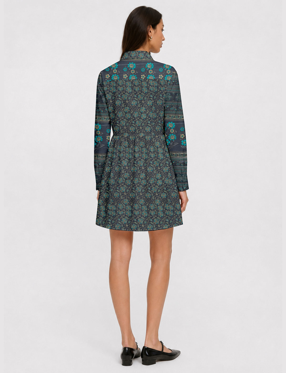 Short shirt dress with a relaxed A-line silhouette, point collar, partial button placket, gathered waist, side pockets, and full-length cuffed sleeves.