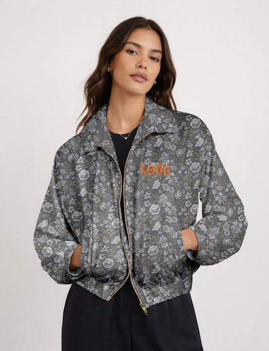 Love Bomber Jacket made from recycled fabric, featuring hand-stitched Aari embroidery. A unique piece of zero-waste clothing, part of the circular fashion movement. Designed with upcycled materials for a stylish yet environmentally friendly clothing choice.