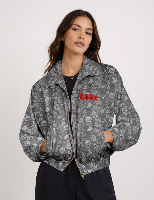 Love Bomber Jacket made from recycled fabric, featuring hand-stitched Aari embroidery. A unique piece of zero-waste clothing, part of the circular fashion movement. Designed with upcycled materials for a stylish yet environmentally friendly clothing choice.