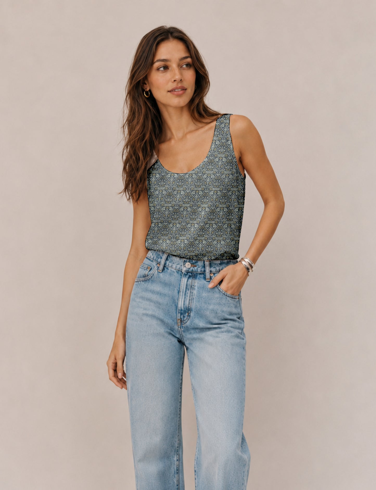 Women's sleeveless blouse with a relaxed straight fit, wide scoop neckline, deep scoop back, and hip-length silhouette.