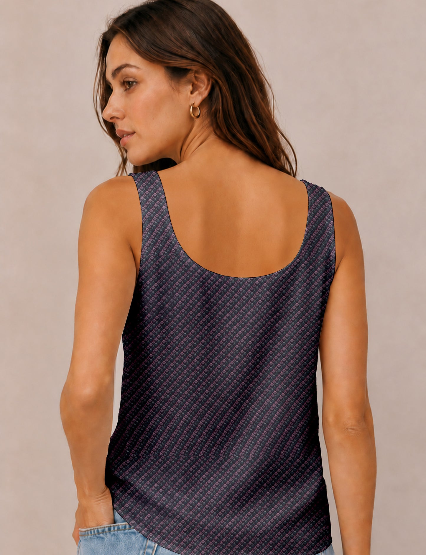 Women's sleeveless blouse with a relaxed straight fit, wide scoop neckline, deep scoop back, and hip-length silhouette.
