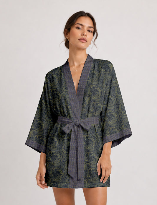 Short kimono robe with wrap front, V-neckline, wide sleeves, waist tie, and concealed skort detail.