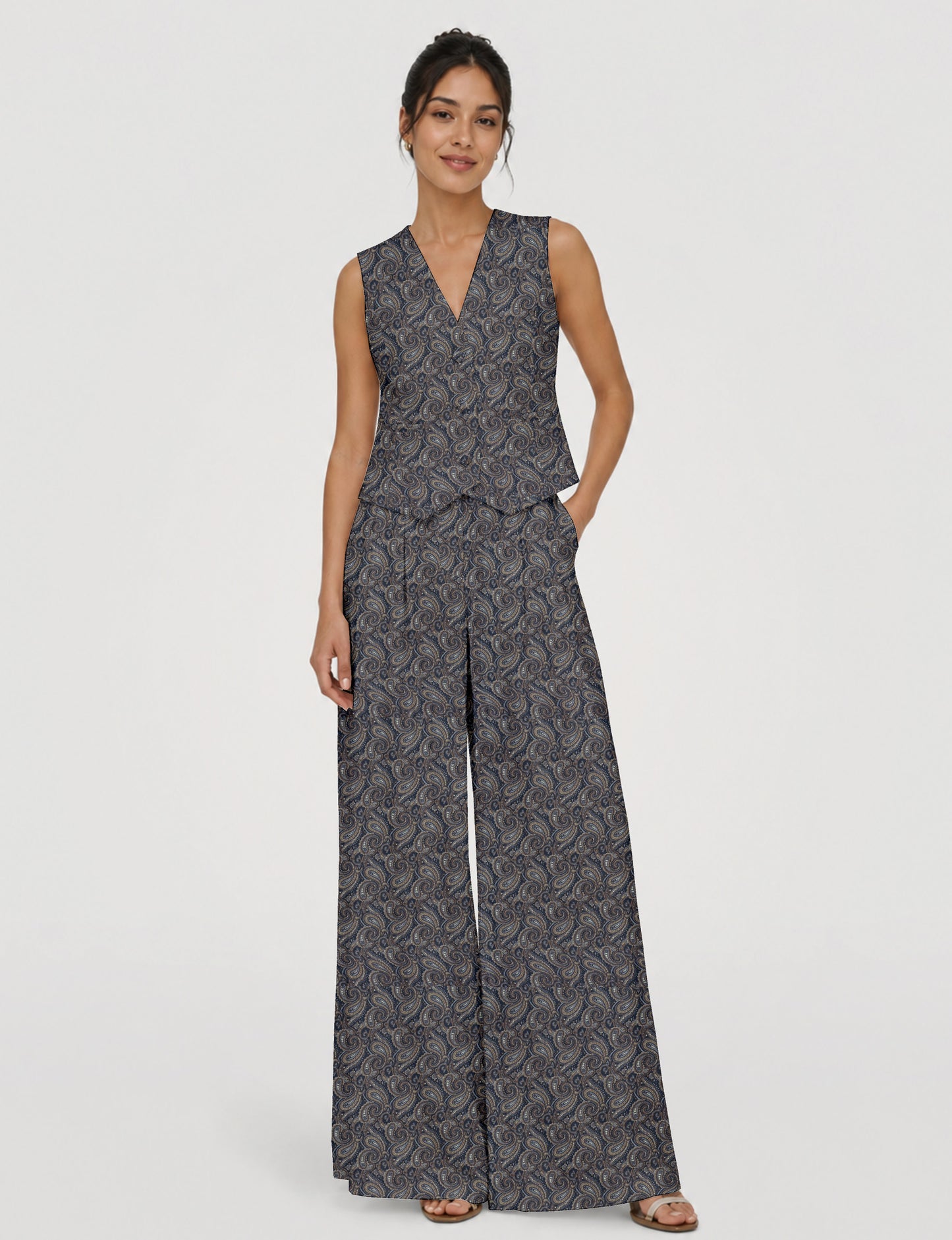 Women's tailored waistcoat set with a sleeveless V-neck button-front waistcoat and high-rise wide leg trousers in a coordinated matching outfit.