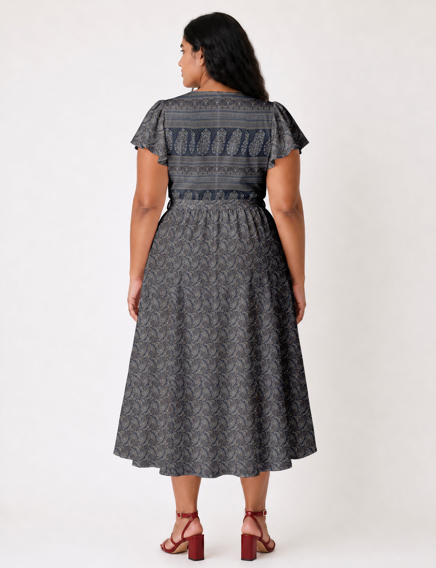 Elegant midi wrap dress with a V-neckline, adjustable waist tie, fitted bodice, and flared skirt for a timeless, flattering silhouette.