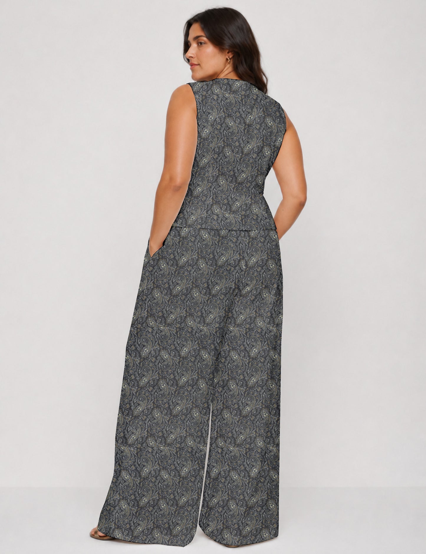 Women's tailored waistcoat set with a sleeveless V-neck button-front waistcoat and high-rise wide leg trousers in a coordinated matching outfit.