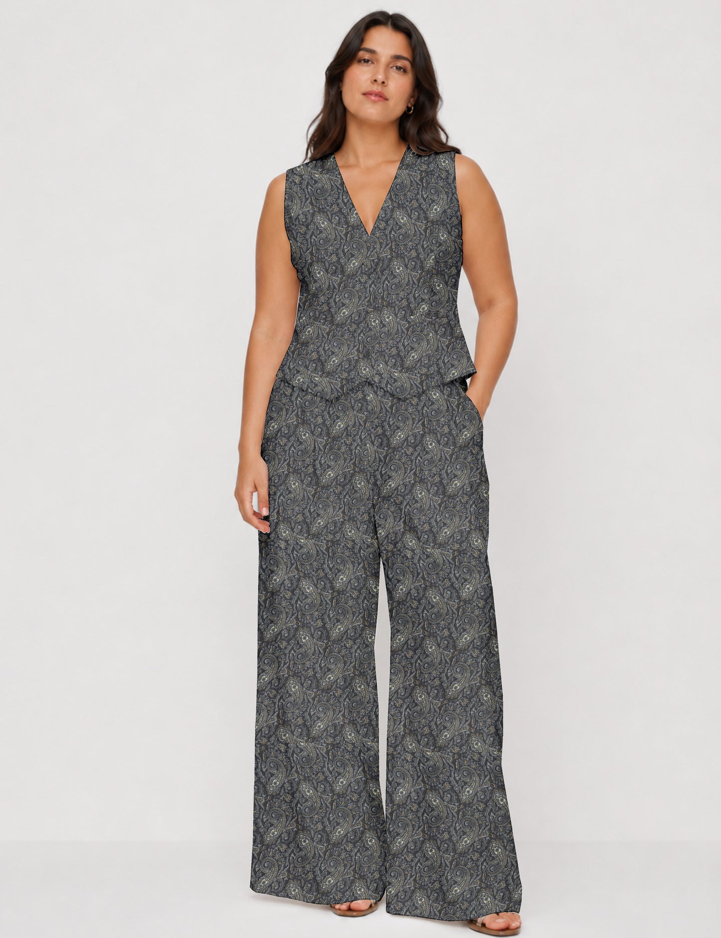 Women's tailored waistcoat set with a sleeveless V-neck button-front waistcoat and high-rise wide leg trousers in a coordinated matching outfit.