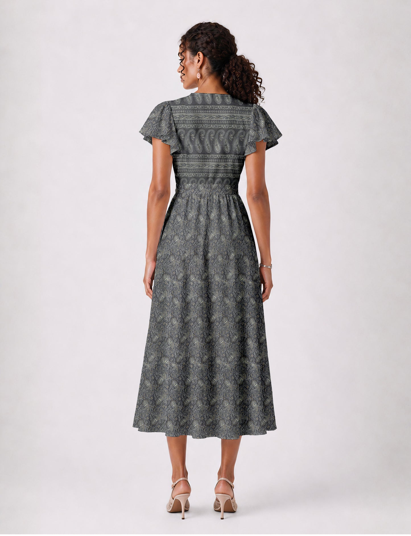 Elegant midi wrap dress with a V-neckline, adjustable waist tie, fitted bodice, and flared skirt for a timeless, flattering silhouette.