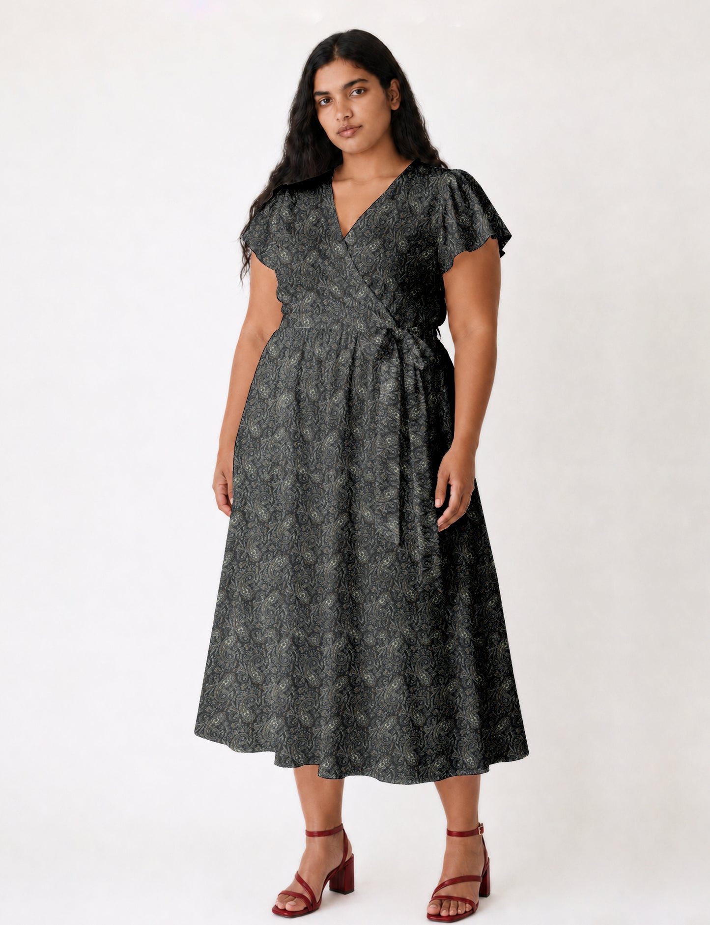Midi wrap dress with V-neckline, fitted bodice, tie waist, and flared mid-calf skirt