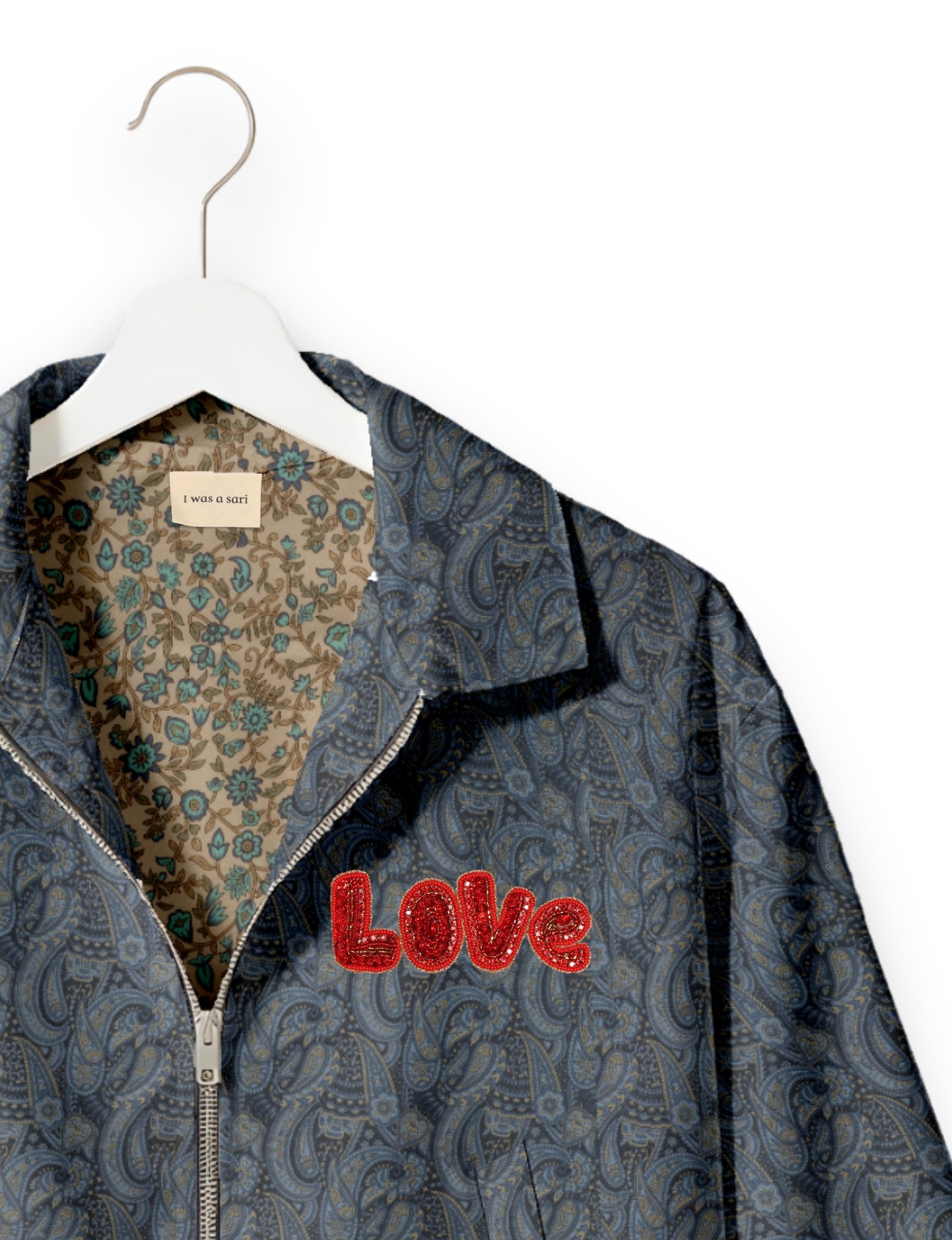 Love Bomber Jacket made from recycled fabric, featuring hand-stitched Aari embroidery. A unique piece of zero-waste clothing, part of the circular fashion movement. Designed with upcycled materials for a stylish yet environmentally friendly clothing choice.