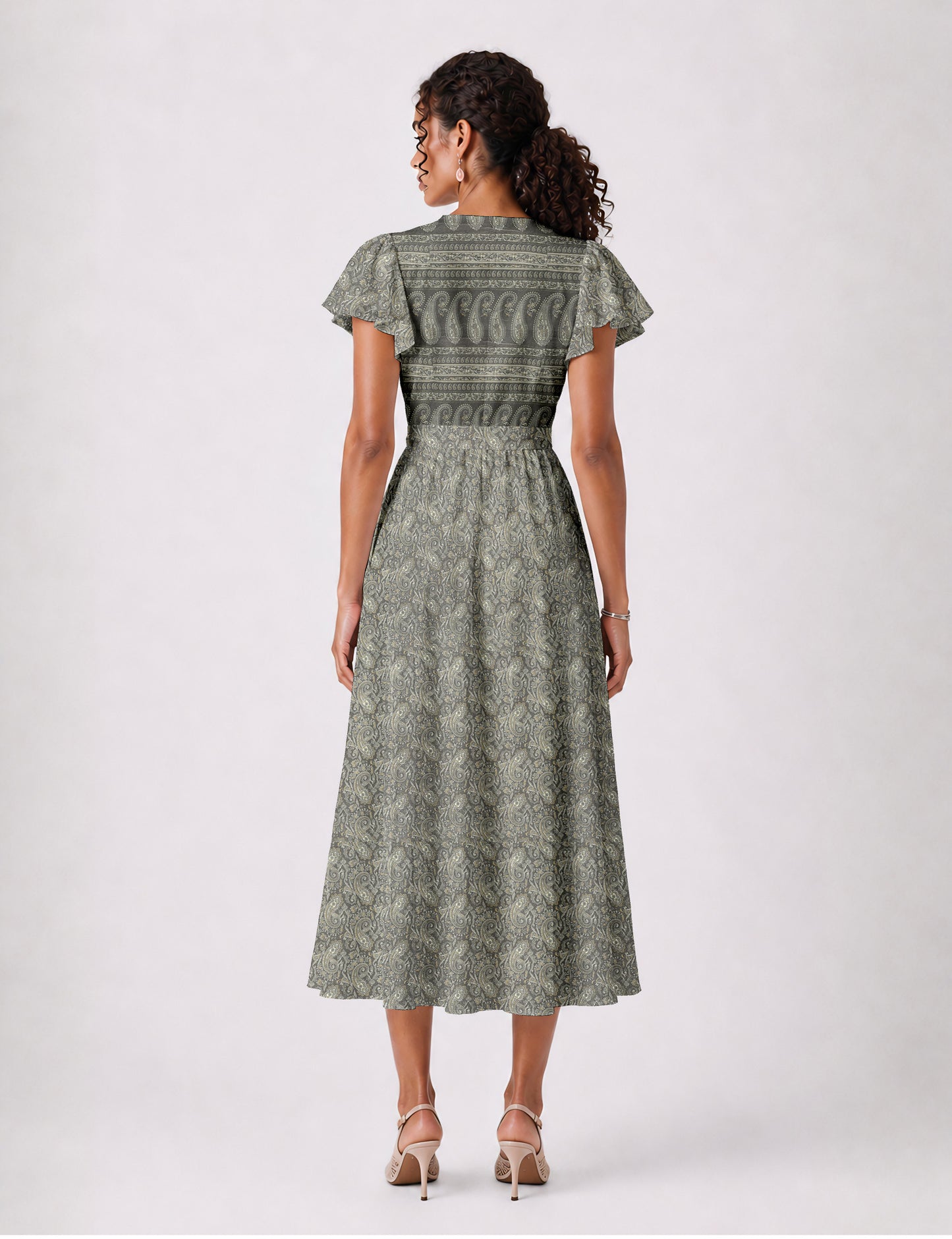 Elegant midi wrap dress with a V-neckline, adjustable waist tie, fitted bodice, and flared skirt for a timeless, flattering silhouette.