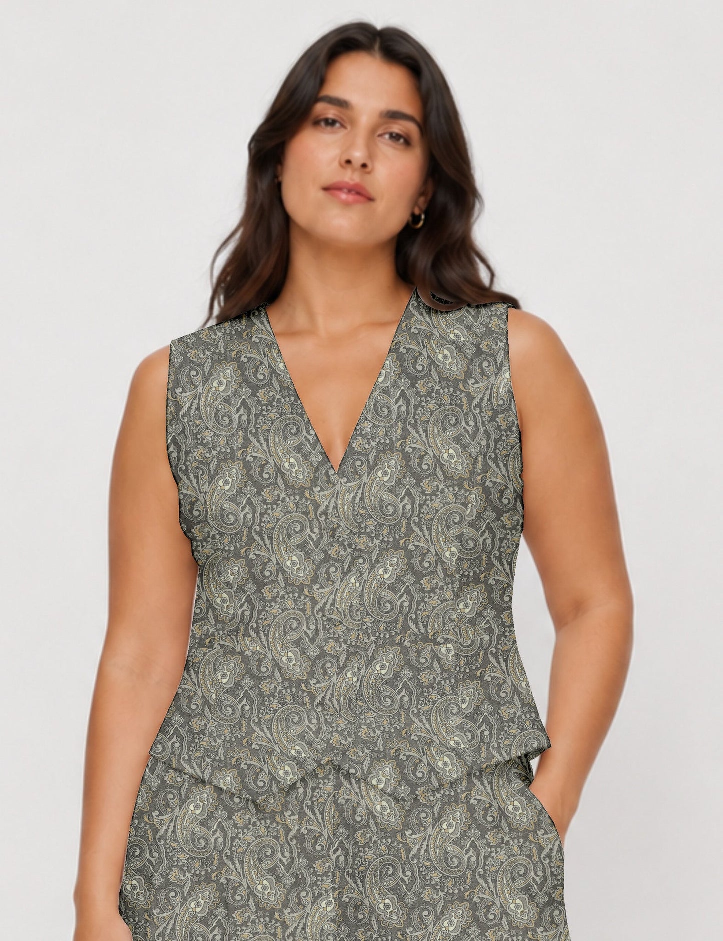 Women's fitted waistcoat with V-neck, single-breasted button closure, tailored silhouette, and pointed hem in sustainable fashion.