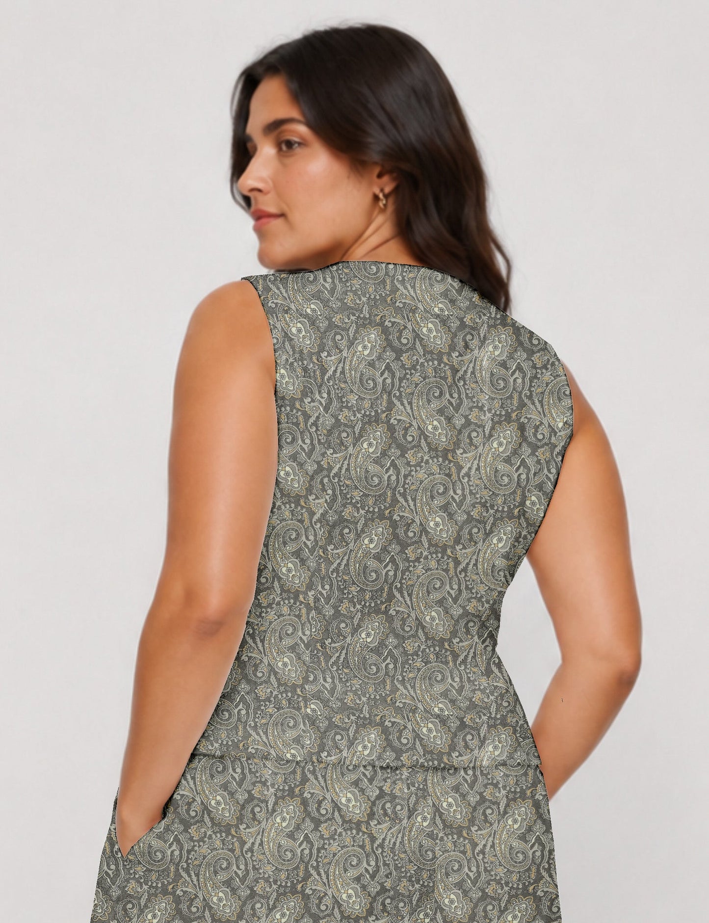 Women's fitted waistcoat with V-neck, single-breasted button closure, tailored silhouette, and pointed hem in sustainable fashion.