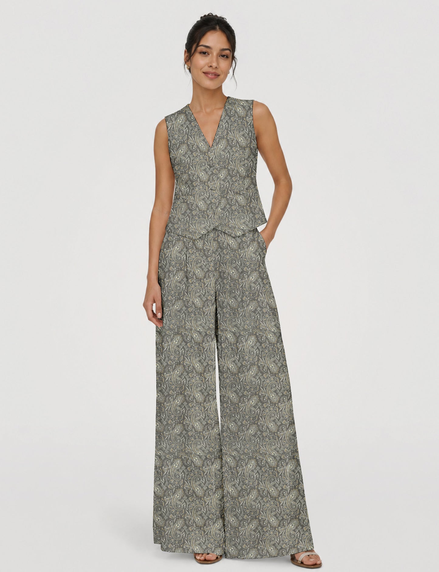 Women's tailored waistcoat set with a sleeveless V-neck button-front waistcoat and high-rise wide leg trousers in a coordinated matching outfit.