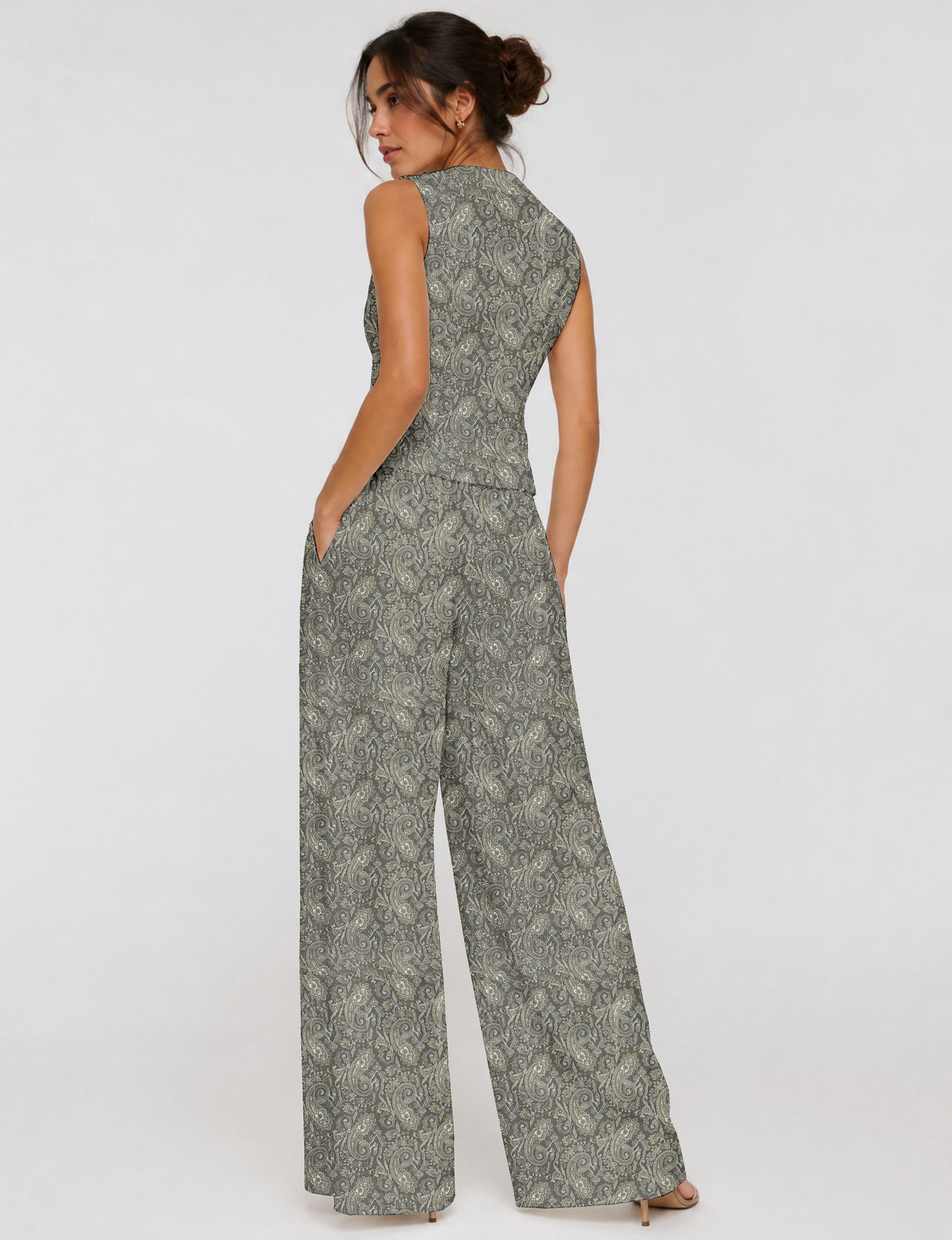 Women's tailored waistcoat set with a sleeveless V-neck button-front waistcoat and high-rise wide leg trousers in a coordinated matching outfit.